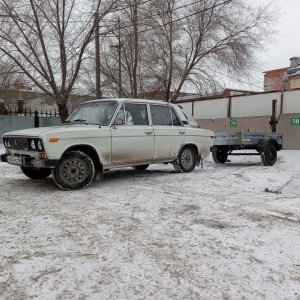 Легковой автомобиль с прицепом