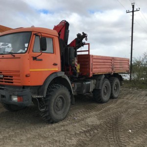 Камаз манипулятор и ямобур. Перевозка, бурение