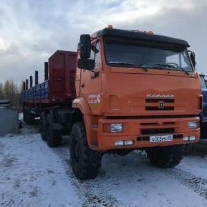 Тягач полуприцеп вездеход бортовой с кониками