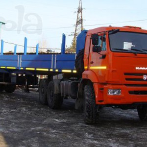 Аренда Камаз 6*6 с полуприцеп.12м.22т. с кониками