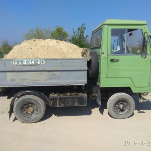 Доставка сыпучих самосвалом