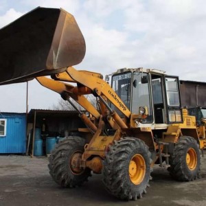 Фронтальный погрузчик амкадор