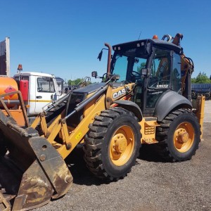 Услуги экскаватора - погрузчика case 695ST