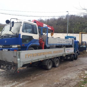 Грузовой эвакуатор манипулятор